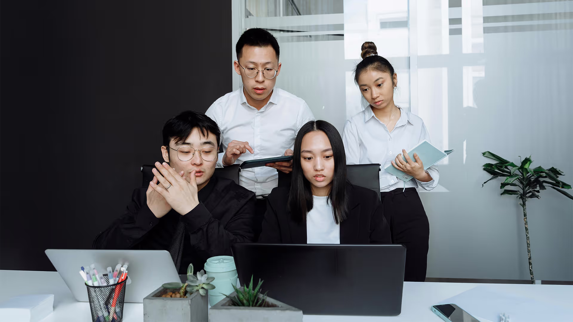 Accounting professionals meeting with clients