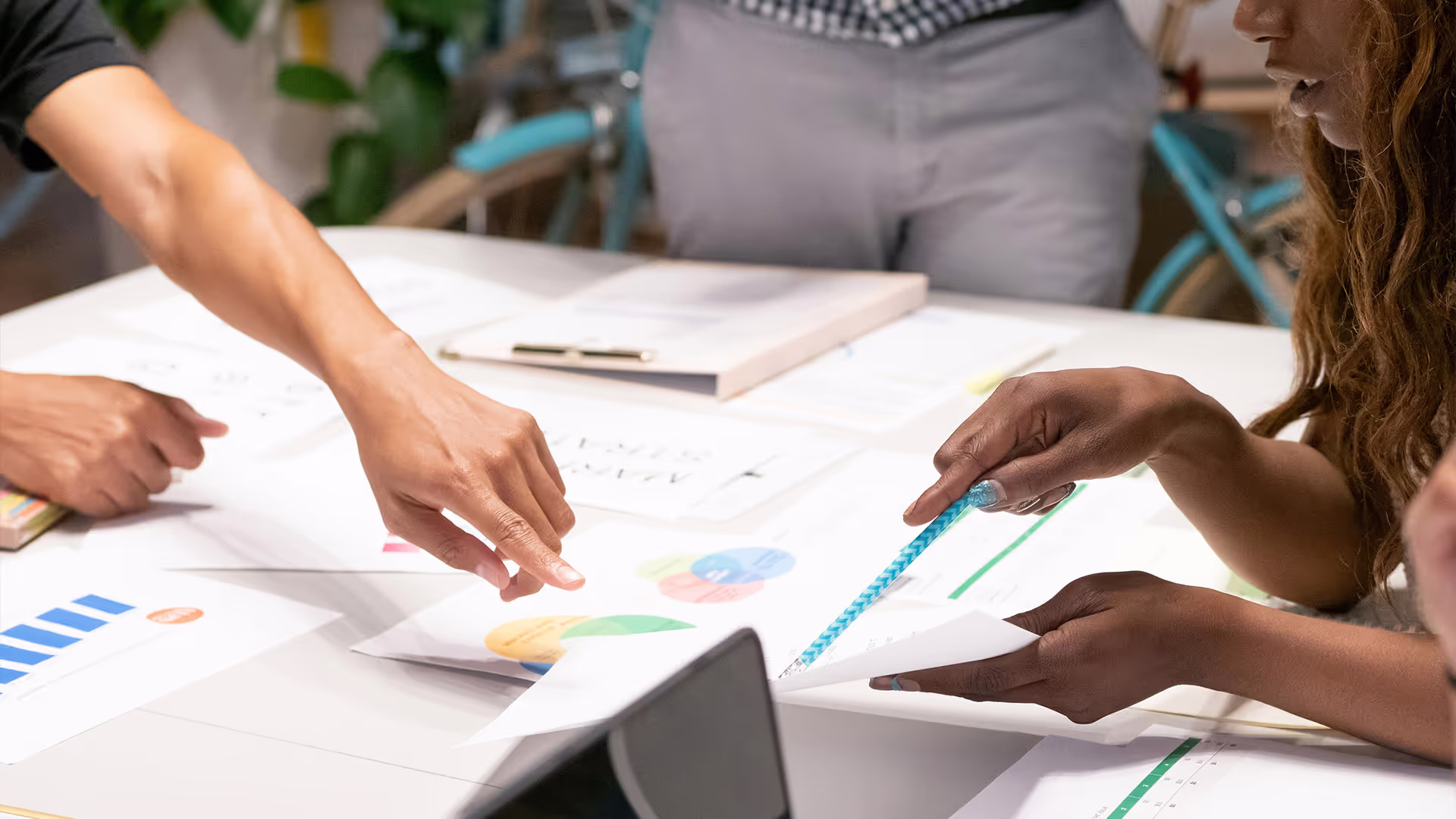 Reviewing financial charts and reports
